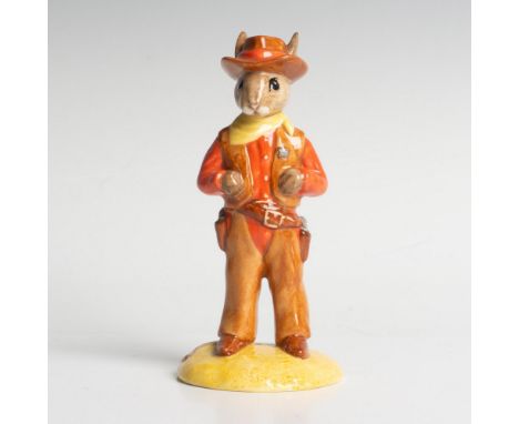 Dressed in Western clothing. Red, brown, and yellow coloration. Royal Doulton backstamp. Artist: K. CurtisIssued: 1999Dimensi