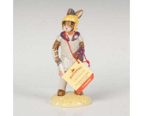 A figure depicting an officer in the ancient Roman army who commanded a unit, dressed in armor, a crested helmet and carrying