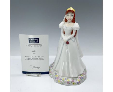 This hand-painted glossy figurine depicts Ariel from The Little Mermaid in her white wedding dress. Royal Doulton and Walt Di