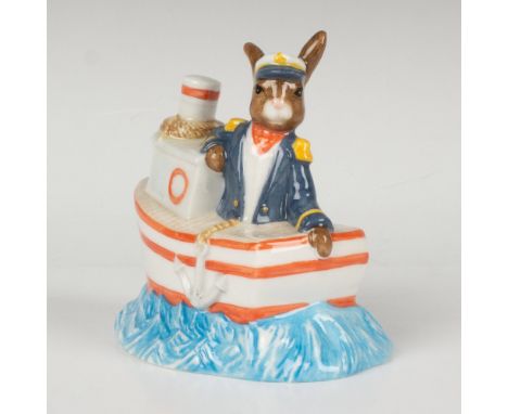 A figure depicting a captain aboard a ship as he sails the sea. This item has its original box: 6"L x 4"W x 6.75"H. Royal Dou