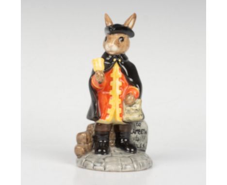 A public announcer wearing historical clothing, holding a bell and a document. This item comes with its original box: 3.5"L x
