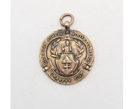 JOCK "TIGER" SHAW OF RANGERS F.C. - A 9ct GOLD GLASGOW JUNIOR FOOTBALL ASSOCIATION CHARITY CUP WINNER'S MEDAL Likely by J. Mc