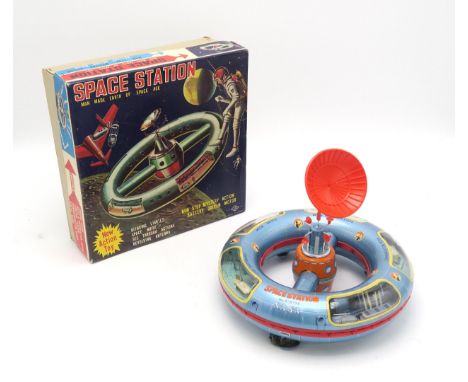 A JAPANESE TINPLATE N.A.S.A. SPACE STATION BY S.H. (HORIKAWA) No. 378795, contained in its original cardboard box Condition R