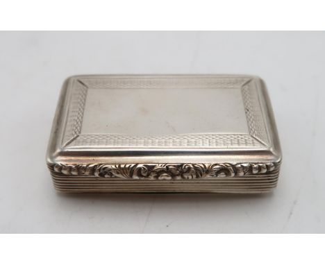 A GEORGE IV SILVER SNUFF BOX by Francis Clark, Birmingham 1825, of bevelled rectangular form, with engine turned decoration a