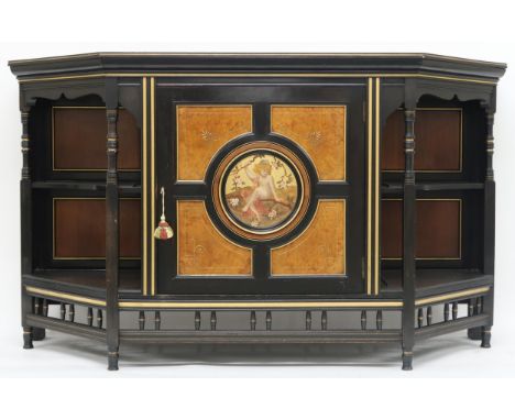 A VICTORIAN AESTHETIC MOVEMENT EBONISED AND GILT CABINET&nbsp; shaped top with moulded cornice over single burl panelled door