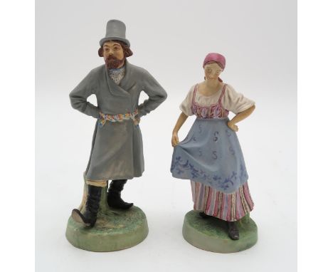 A PAIR OF RUSSIAN BISQUE FIGURESmodelled as a man and woman dancing, in the style of Gardner, impressed mark to base, 19.5cm 