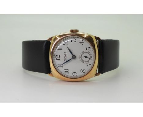 A 9CT LONGINES WATCH with white enamel dial with&nbsp; black roman numerals, subsidiary seconds dial and blued steel hands. T