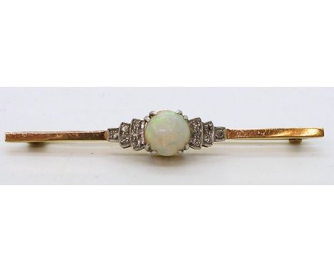 AN OPAL AND DIAMOND BROOCH set in 18ct yellow gold and platinum, set with a central round opal of approx 8mm, with three step