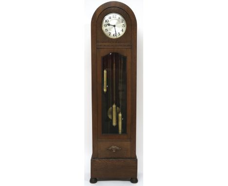 AN EARLY 20TH CENTURY OAK CASED DOME TOPPED LONGCASE CLOCK  with silvered dial bearing Arabic numerals, 26cm diameter over gl