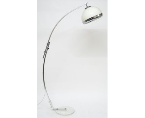 A MID 20TH CENTURY ITALIAN "ARC" FLOOR LAMP  with adjustable white and chrome plastic shade on brushed steel arc support term