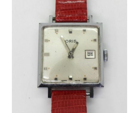 A VINTAGE ORIS WATCH with a square chromed dial diameter 2.7cm, square dot numerals, blunt shaped hands and date aperture. Wi