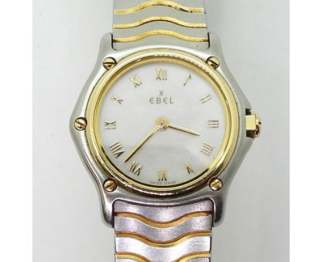 A LADIES EBEL WRISTWATCH stainless steel and 18ct gold, with a mother of pearl dial, gold coloured Roman numerals and baton h