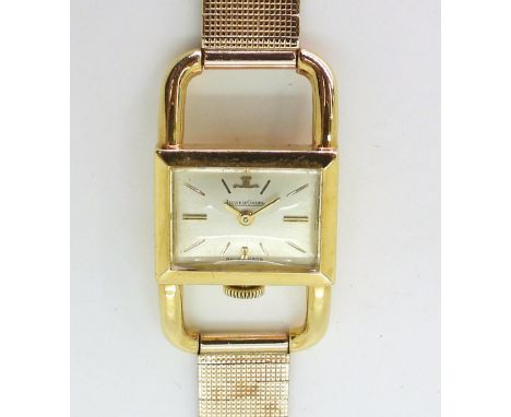 A LADIES RETRO JAEGER LE COULTRE WATCH the case is 18ct gold with Swiss hallmarks, and oversized 'D' shaped lugs, with a 9ct 