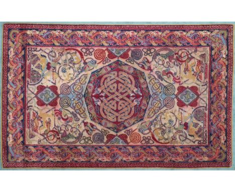 A 20TH CENTURY GEORGE BAIN FOR QUAYLE &amp; TRANTER LTD, KIDDERMINSTER "HUNTING" CARPET&nbsp; with beige ground with red Celt