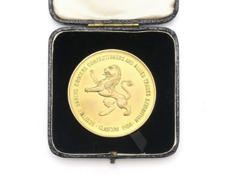 A 9ct GOLD SCOTTISH BAKERS GROCERS CONFECTIONERS AND ALLIED TRADES EXHIBITION, GLASGOW 1936 PRESENTATION MEDAL By the Alexand