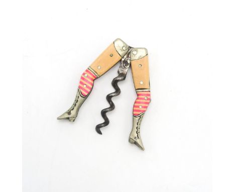 A GERMAN NOVELTY "LADY'S LEGS" CORKSCREW Circa-1900, the lady wearing pink and white stripey stockings, the shaft apparently 
