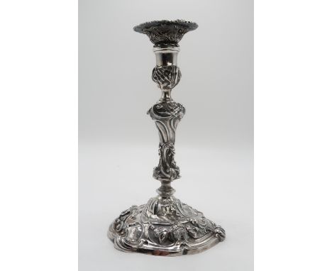 A GEORGE II CAST SILVER CANDLESTICK&nbsp; maker's mark E?.S, London 1748, with a knopped baluster stem, with scrolling foliat