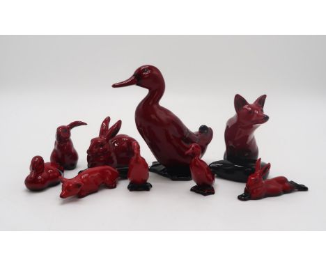 A GROUP OF ROYAL DOULTON FLAMBE ANIMALS AND BIRDS including a duck 16cm tall, three smaller examples, two hares, a rabbit and
