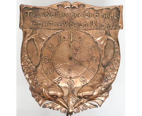 A LATE VICTORIAN HAMMERED COPPER ARTS & CRAFTS WAG AT THE WA CLOCK with stylized hammered copper face embossed with motto "TH