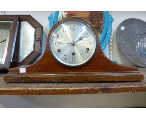 A mahogany mantel clock