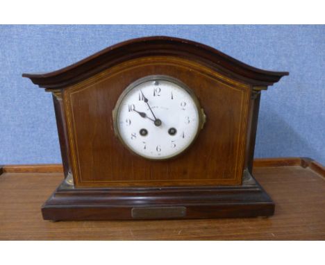 A Walker &amp; Hall mantel clock and a cuckoo clock