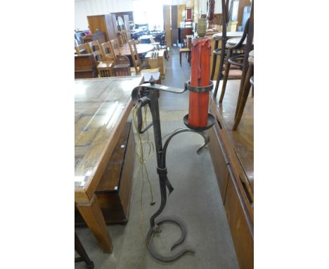 A French wrought steel standard lamp