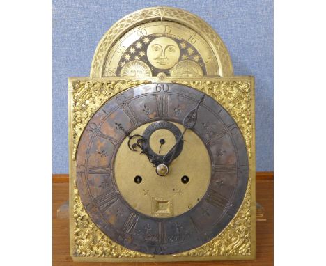 A George III longcase clock movement with rolling moon, date aperture and seconds subsidiary dial at 12 o'clock