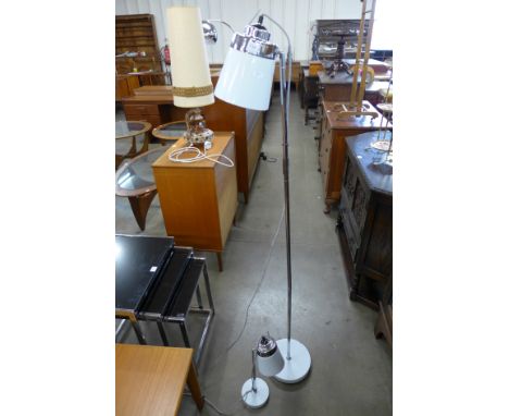 A chrome and enamelled standard lamp and a matching table lamp