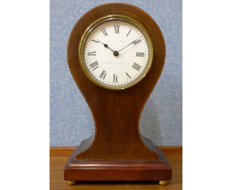 An early 20th Century French inlaid mahogany balloon mantel clock