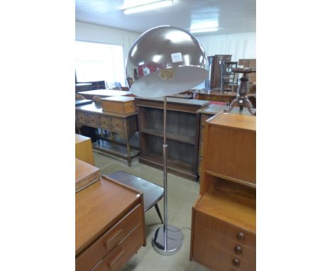 A chrome standard lamp