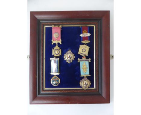 SET OF SILVER GILT RAOB JEWELS MOUNTED IN A FRAME (5)