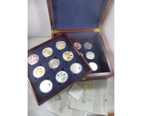 SET OF 18 SILVER PROOF 'COLORIZED' AND OTHER ONE DOLLAR COINS IN FITTED PRESENTATION CASE