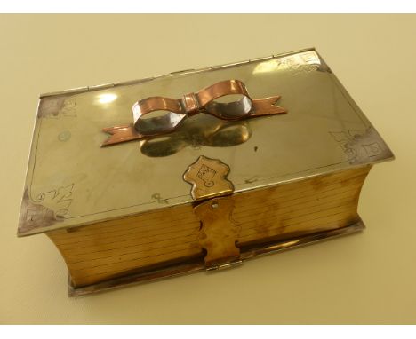 AN UNUSUAL VICTORIAN SILVER PLATED NOVELTY BISCUIT TIN IN THE FORM OF A BOX, ENGRAVED LID AND CLASP, INTERIOR WITH PIERCED GI