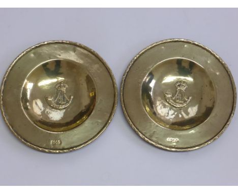 2 CIRCULAR BRASS PLAQUES WITH ARMS FOR DURHAM LIGHT INFANTRY, IMPRESSED 1916 (SOMME?) APPROX. 26 cm DIA.