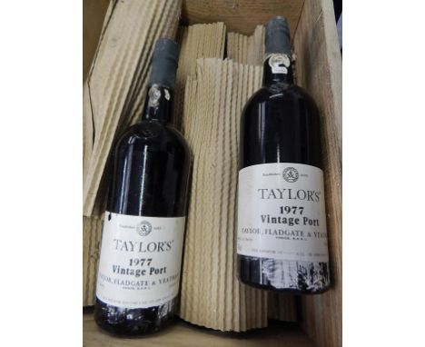 CASED BOX OF 11 BOTTLES OF TAYLORS 1977 VINTAGE PORT. NON TRADE SALE
