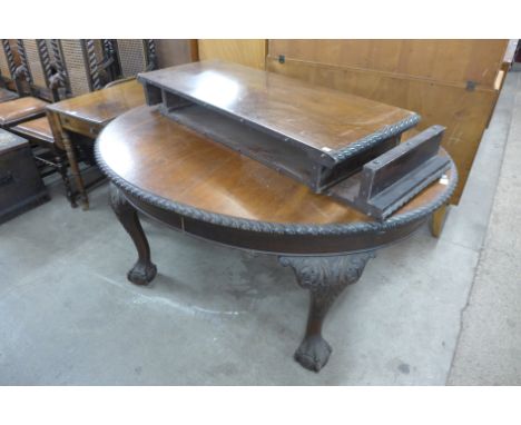 An Edward VII Chippendale Revival mahogany extending dining table