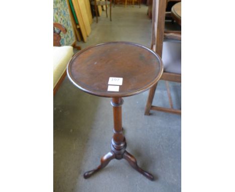 A mahogany tripod wine table