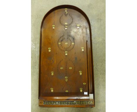 A vintage bagatelle board