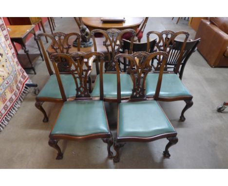 A set of five Chippendale Revival mahogany dining chairs