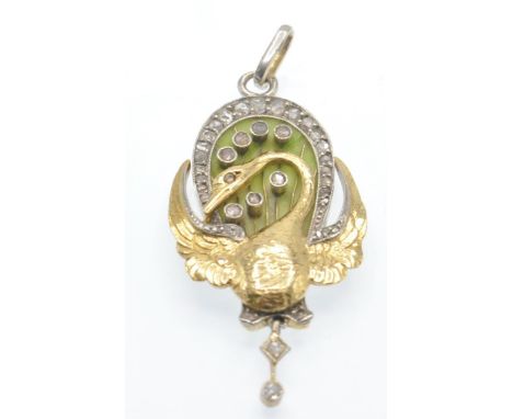 A cased Art Nouveau 18ct gold and diamond  plique-à-Jour necklace pendant. The pendant depicting a swan surmounted by a pliqu