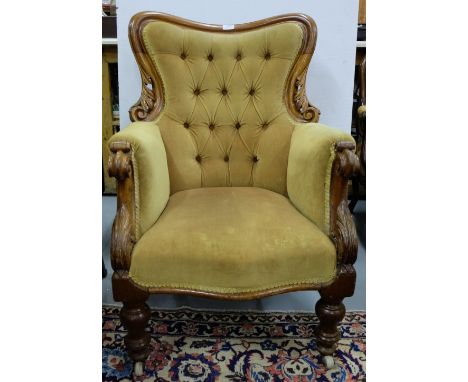 Late 19thC Mahogany Framed Library Armchair, the scrolled-shaped top rail over a button detailed back and padded seat, mustar