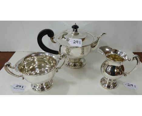 3 piece Irish Silver Teaset including Teapot with ebony handle and lid finial, a Sugar Bowl and Cream Jug, 1929, stamped W & 