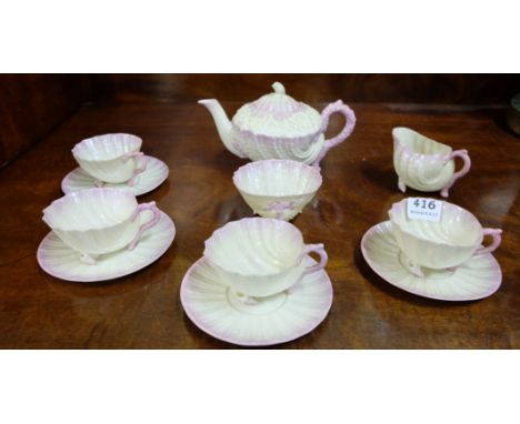 2nd Period Belleek 4-Place Teaset, Neptune design, including 4 Cups, Saucers and a milk jug, sugar bowl and teapot, pink hues