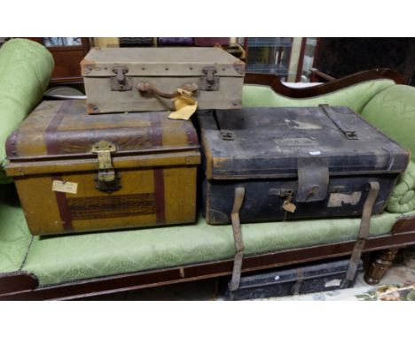 2 steel trunks (with Strahan labels), 1 leather trunk and a canvas suitcase (4)