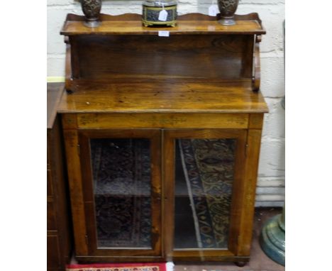 Regency Rosewood Chiffionier, the upper gallery shelf supported on S-scroll brackets, over a base with two glass doors and br