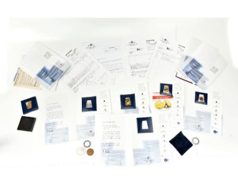 A group of London Mint Office collectors' and commemorative coins including silver examples, all in original packaging with c