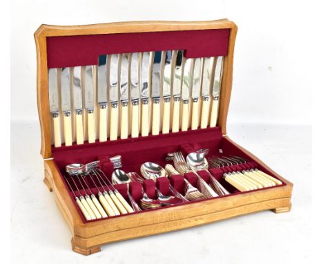 RELIANCE; a silver plated oak cased canteen of cutlery.