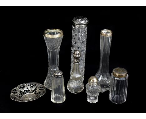 A group of silver topped and collared clear glass dressing table jars and bottles, two silver collared vases, and a German .8