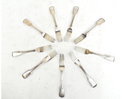 THOMAS WALLIS II &amp; JONATHAN HAYNE; a set of nine George III hallmarked silver table forks, each with engraved crest and m