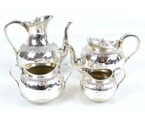 MARTIN HALL &amp; CO; a good Victorian hallmarked silver four piece tea service with bead decorated rims and bands of both en